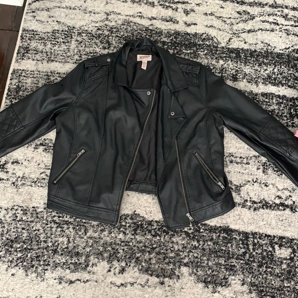 Leather jacket. Lots of pockets. Great for cold.